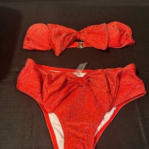 Women’s sparkle, two piece bikini featuring glitter.